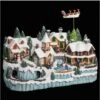 Feeric Christmas - Village De Noël Lumineux Et Animé Avec Train Enfants Sur Patinoire Et Père Noël Sur Son Traîneau -Lemax Decor Magasin 75264468 1
